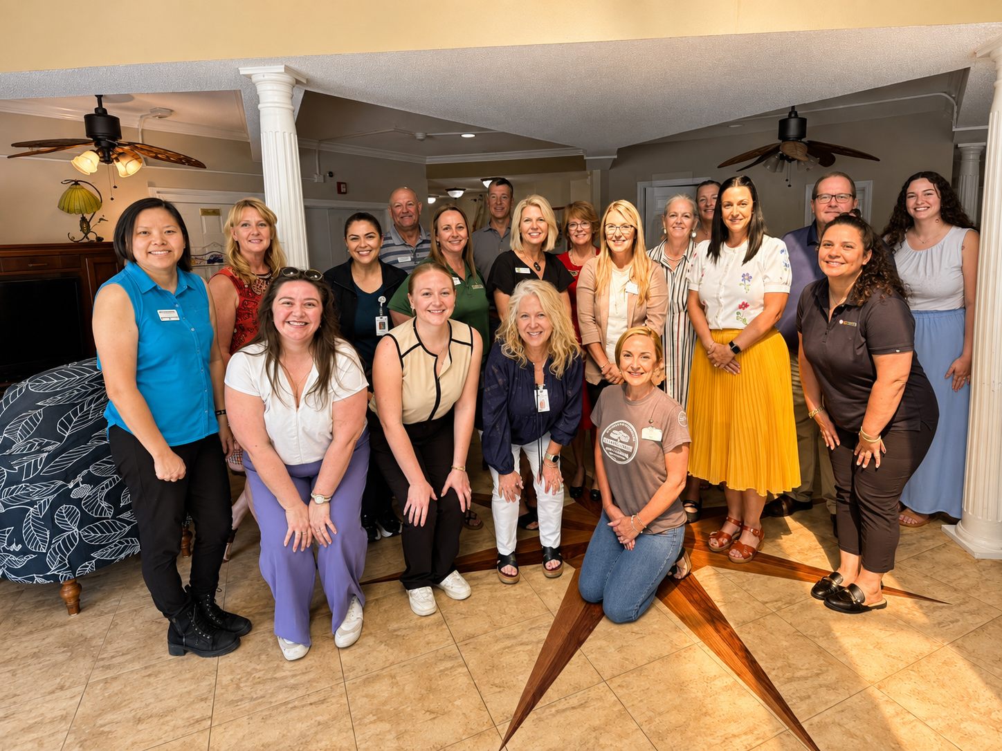 Autumn Ridge associates gathered in the lobby, the people on site around the clock for Residential Care